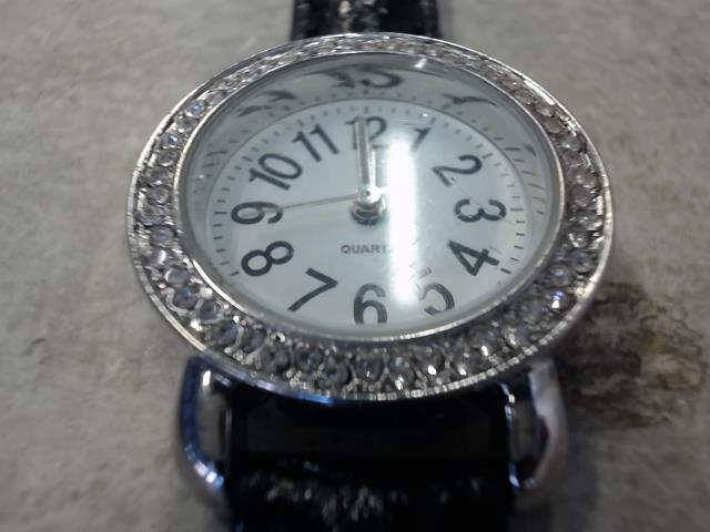 Montre bracelet cuir diamants