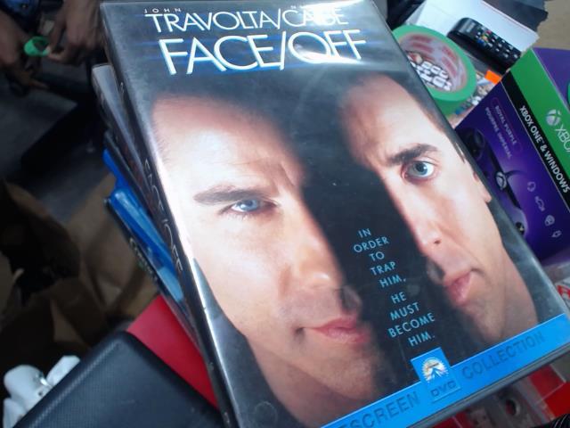 Travolta/cage faceoff