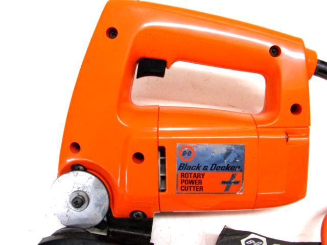 Reversing rotary power cutter