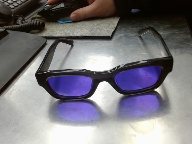 Purple lens shades 'what would tupac do'