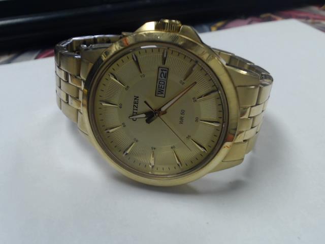 Montre citizen gold