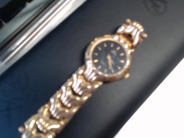 Omax golden watch