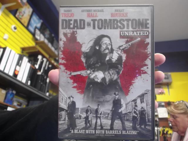 Dead in tombstone