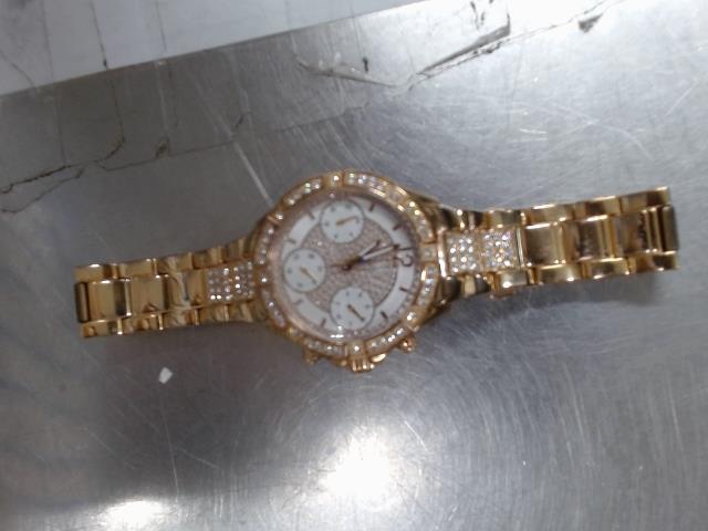 Montre guess dorer avec diamnd