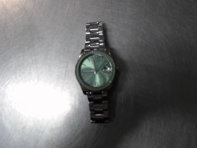 Montre fossil face verte