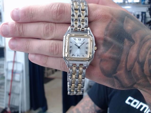 Montre cartier argent et or