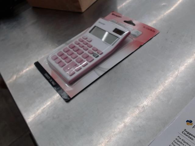 Sharp digital calculator