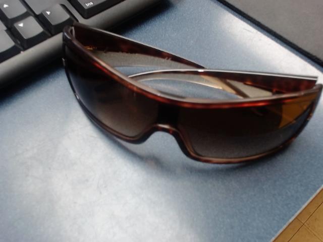 Brown wrap around shield sunglasses