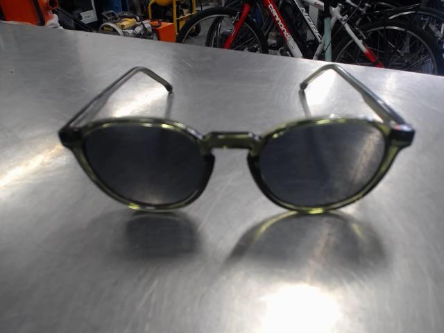 Komono green sunglasses in soft case