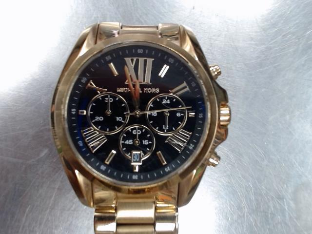 Michael kores montre en or