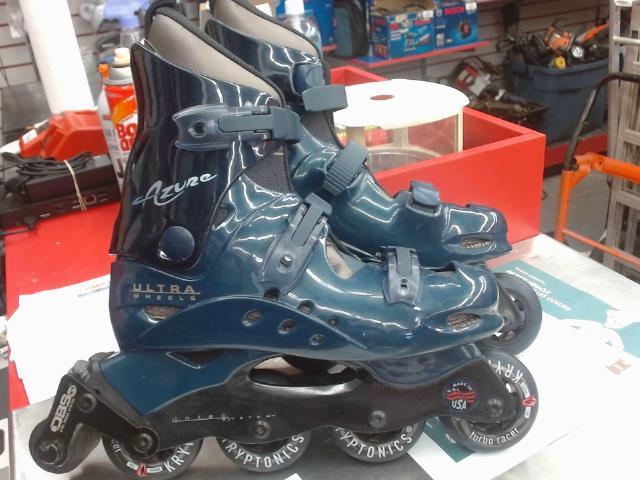 Patins a roues alignees comme neuf