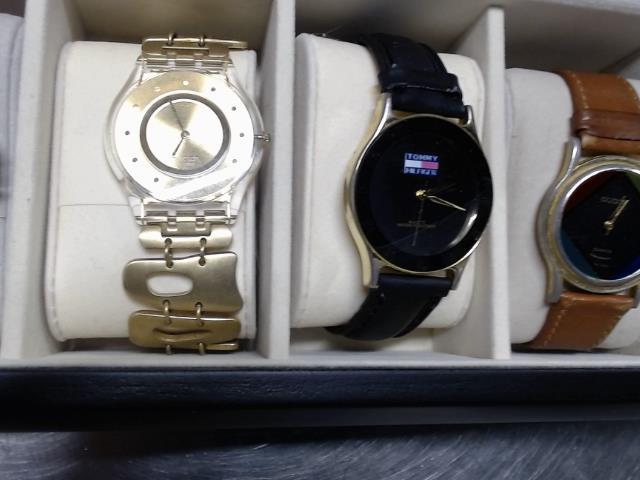 Montre swatch gold tone plate ag 2006