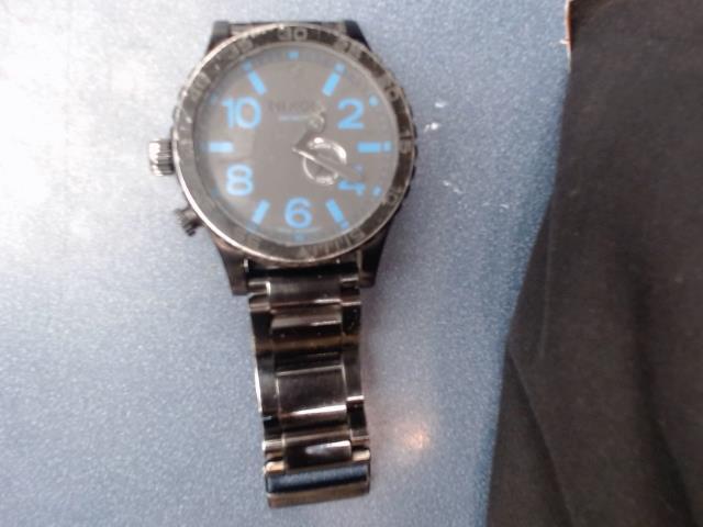 Montre nixon noir shiffre bleu