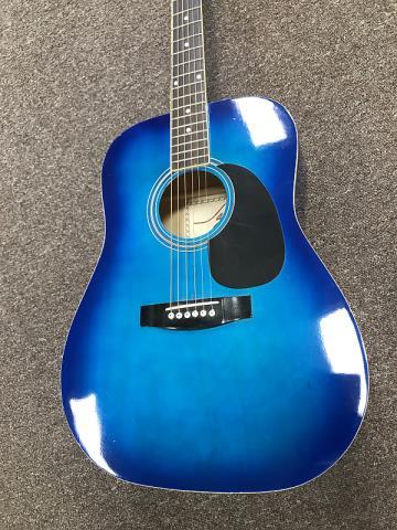 Guitar acoustique bleu dans boite jay-tr