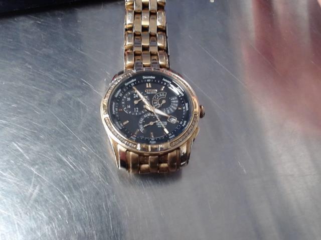 Montre citizen eco drive gold tone+pierr