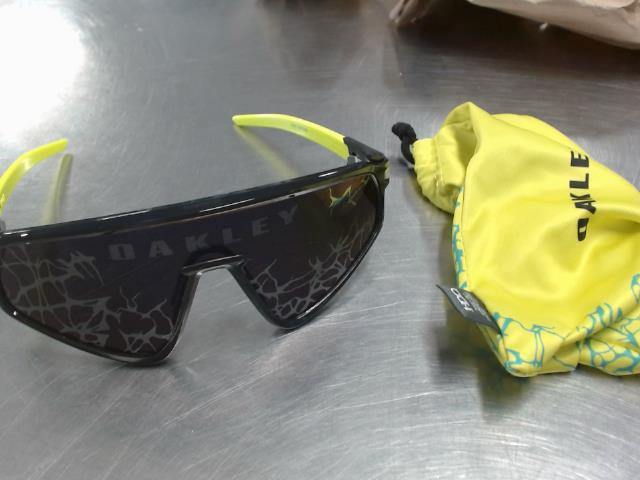 Oakleyu black and yellow sunglasses