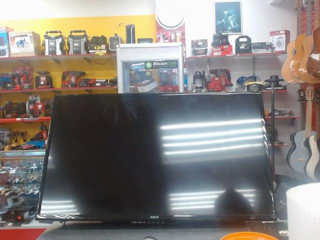 Television avec manette et ss pied