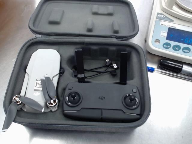 Diji mavic mini +case+man+kit achete ici