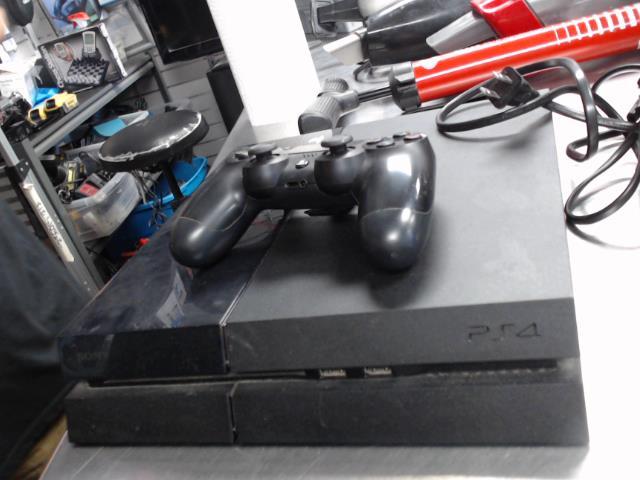 Console ps4+man+chargeur man +fil