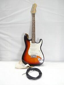 Guitare electrique marron noire orange