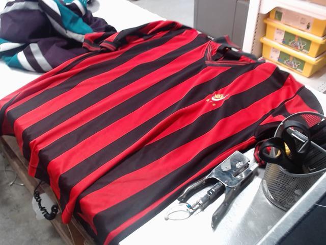 Red black soccer jersey