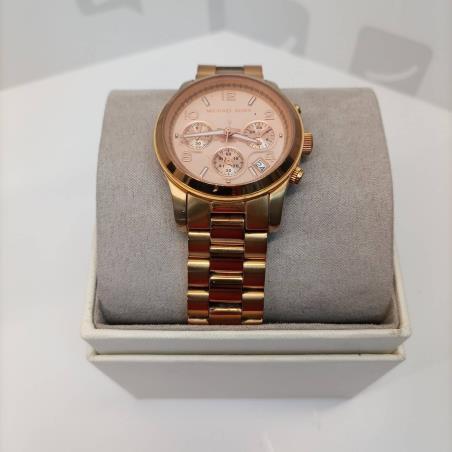 Montre femm mk golds color