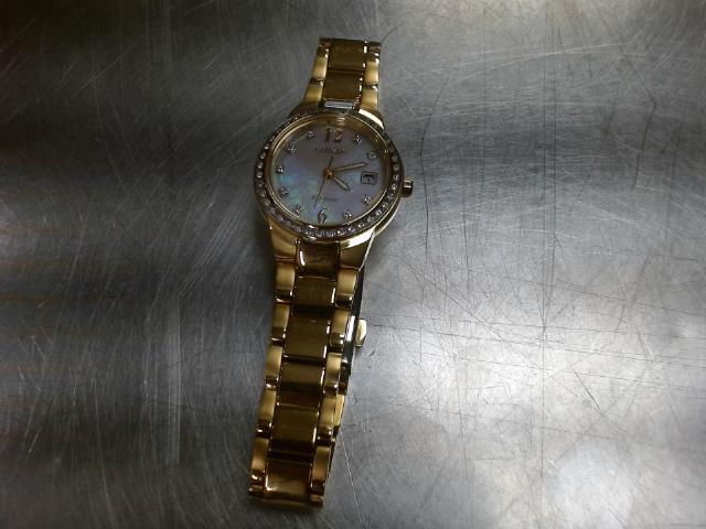 Montre femme citizen couleur gold