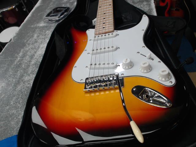 Guitar electric sunburb and white