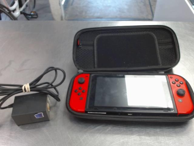 Switch joy con rouge+chargeur dans case