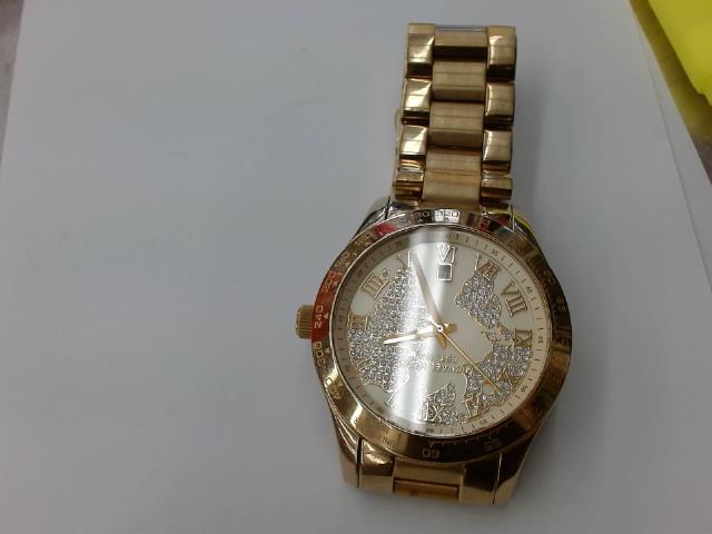 Montre michael kors couleur or avc conti