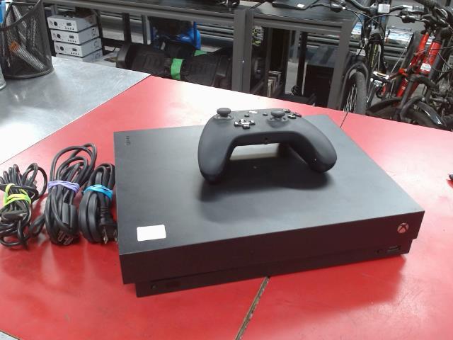 Console xbox one x + manette + fils