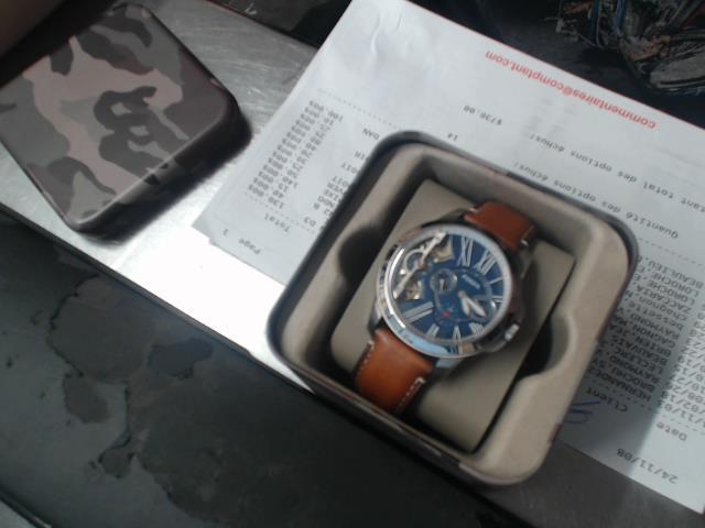 Montre fossil dans boite armer