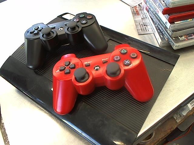 Ps3 avec une manette rouge + 7 jeux