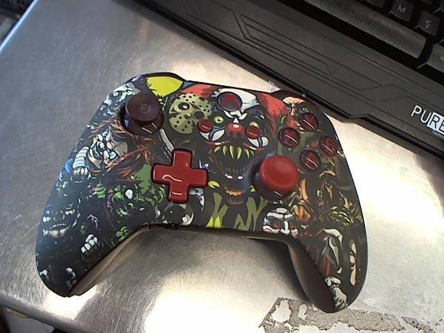 Manette avec motif chucky,it