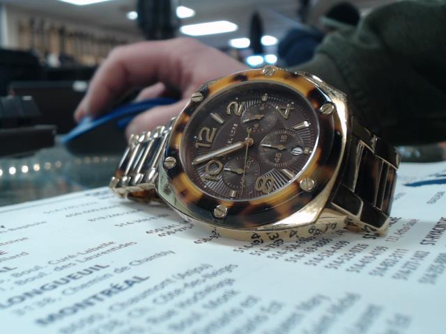 Montre gold et leopard