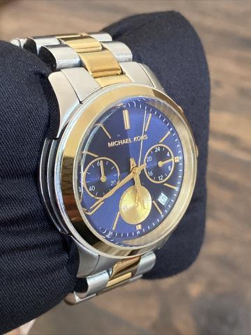 Montre micheal kors gold and steel color