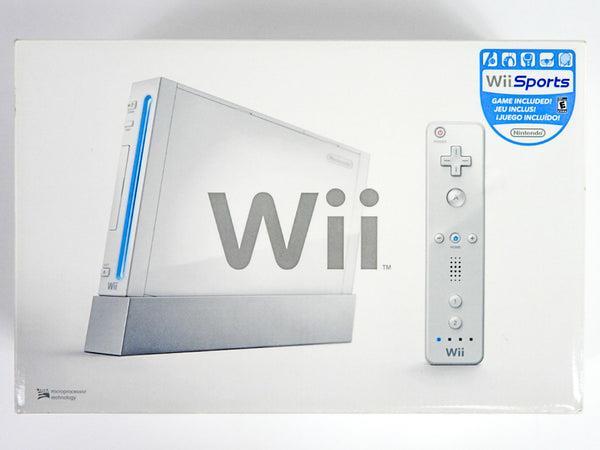 Nintendo wii blanche +manettes et cables