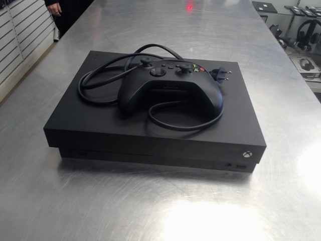 Console one x avec man