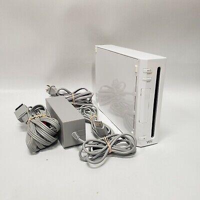 Wii avec accessoires + jeu mystere