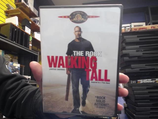 The rock walking tall