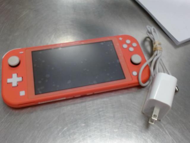 Console switch lite + chargeur(not og)