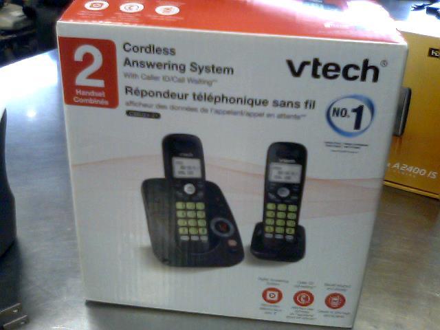 1 telephone vtech noire  1 panasonic