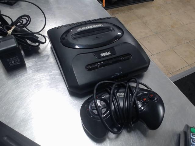 Sega genesis + man + fils