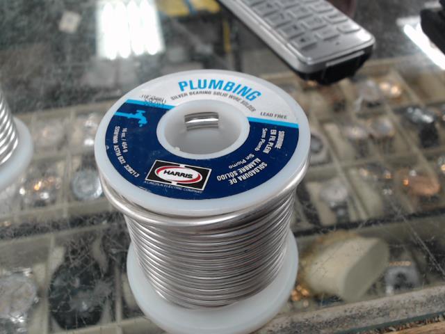 Silver bearing solid wire solder