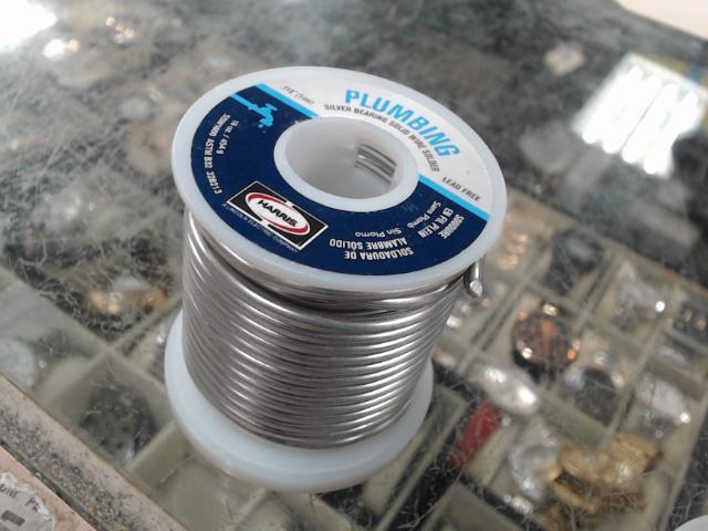 Silver bearing solid wire solder