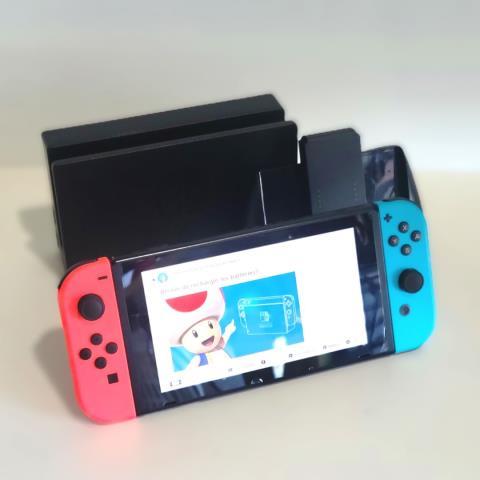 Nintendo switch + dock + fils man-g fini