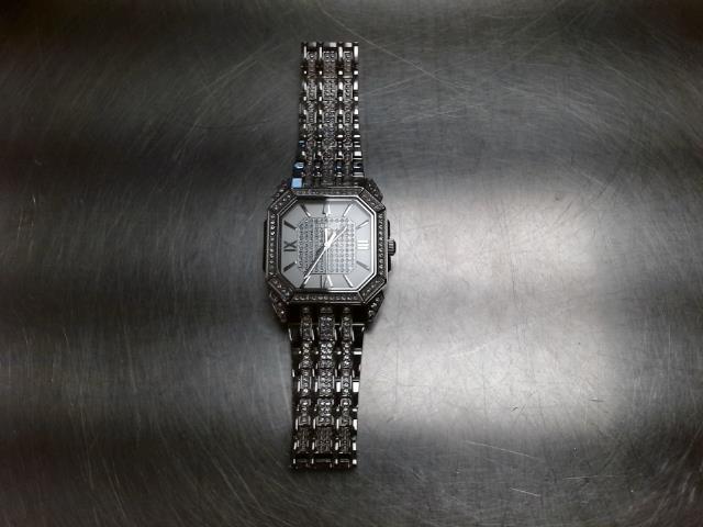 Montre homme chrome avec pierre blanche