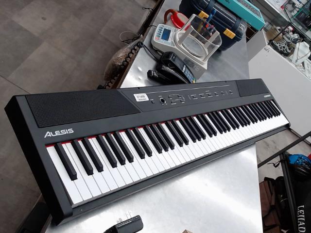 Piano digital alesis concert + power sup