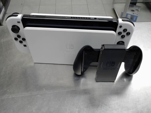 Nintendo switch oled blanche + acc