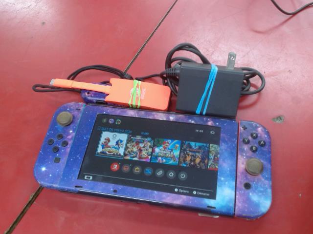 Console switch+chargeur+acc